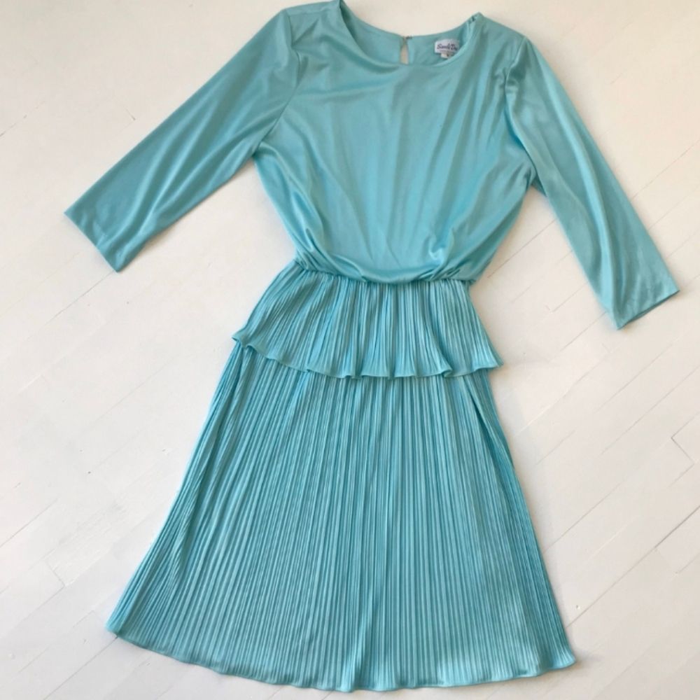 Vintage dress with peplum waist and pleated skirt